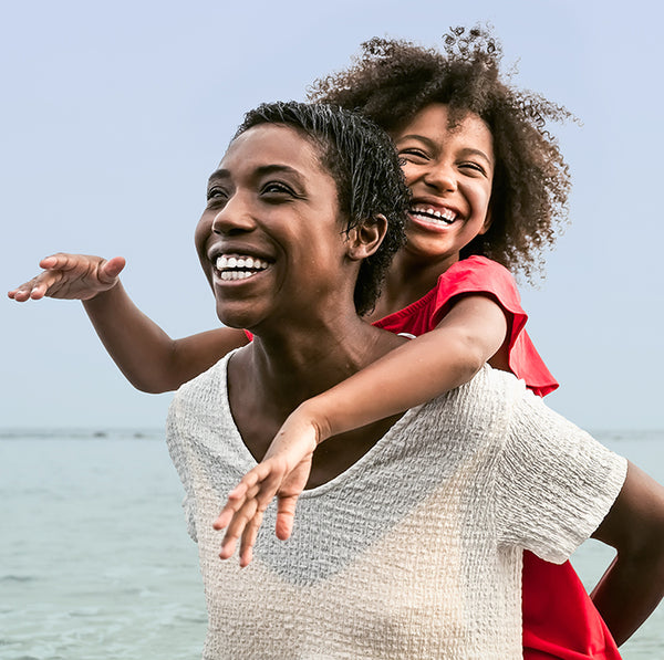 Woman and child smiling